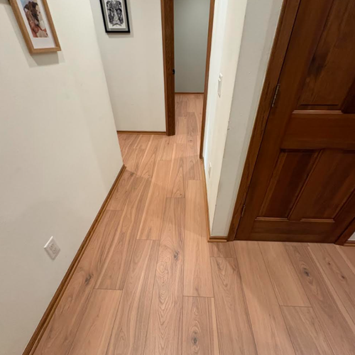 Mannington laminate flooring in Restoration Revival Warmth installed by Bisbee's Flooring