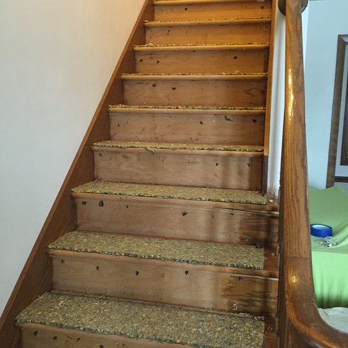 Hardwood flooring installation on stairs in McFarland, WI by Bisbee's Flooring Center