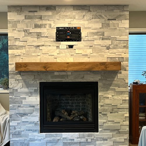 Tile fireplace in McFarland, WI by Bisbee's Flooring Center