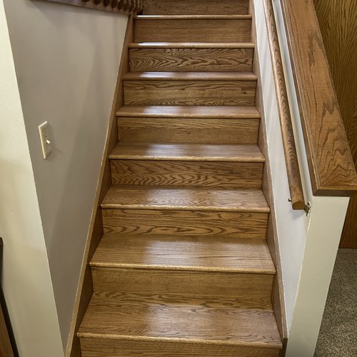 Wood stairs flooring installation in McFarland, WI by Bisbee's Flooring Center