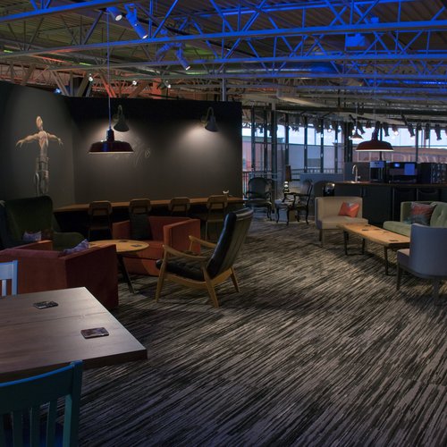 Dark carpet flooring in a lounge by Bisbee's Flooring Center in McFarland, WI