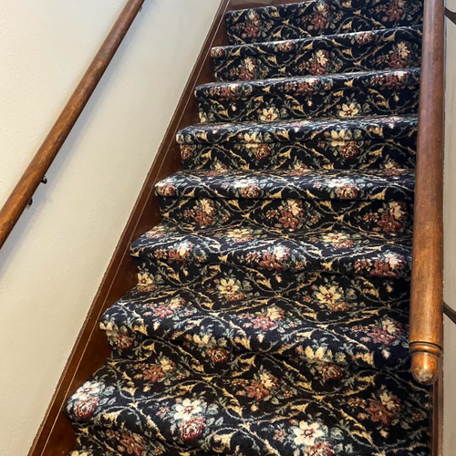 Floral carpeting on stairs