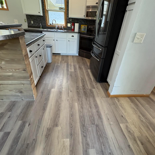 Durable Adura Max LVP Floor in a McFarland kitchen