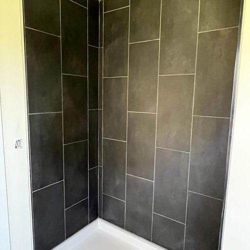 Dark Shower Tile in McFarland, WI by Bisbee's Flooring Center