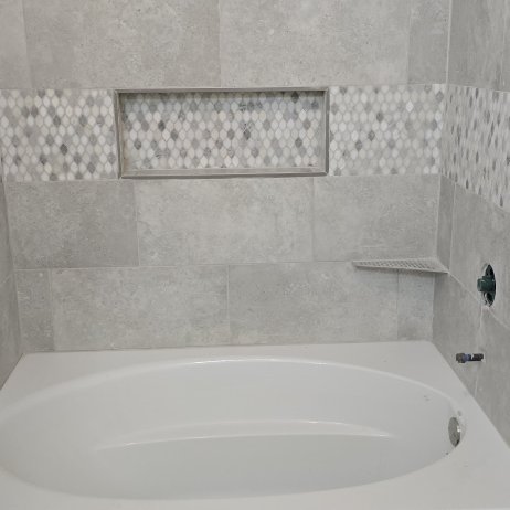 Grey shower tiles installed by Bisbee's Flooring Center in McFarland WI