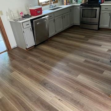 Luxury Vinyl floors in a McFarland, WI kitchen by Bisbee's Flooring Center