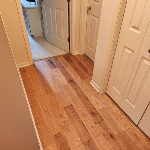 Wood flooring in a McFarland, WI home by Bisbee's Flooring Center