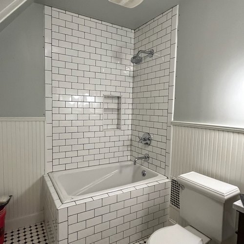Subway tile shower walls in McFarland, WI by Bisbee's Flooring Center