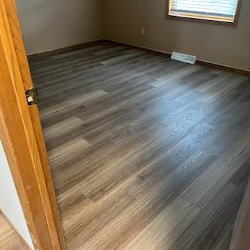 Luxury Vinyl floors in a McFarland, WI home by Bisbee's Flooring Center