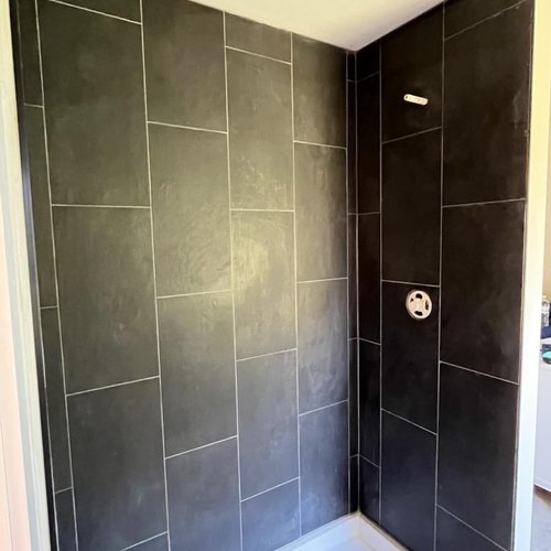 Dark Shower Tile in McFarland, WI by Bisbee's Flooring Center
