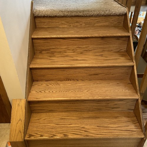 Wood stairs flooring installation in McFarland, WI by Bisbee's Flooring Center